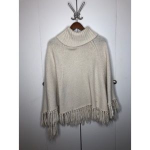 Cream knit turtle neck poncho with fringe LOFT